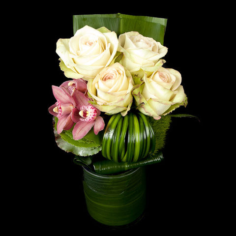 Roses and Cymbidium Orchid Blossoms